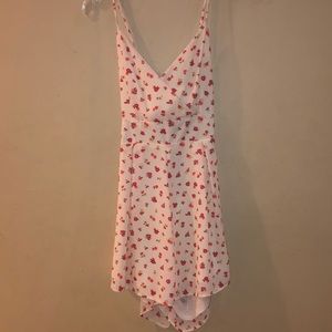 Altar’d state romper with cutout in back